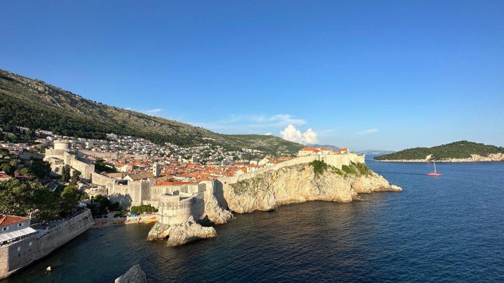 a city on a cliff above water